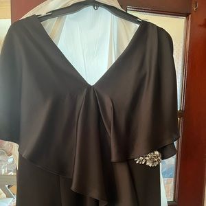 Brand new without tags. Never worn mother of the bride gown.